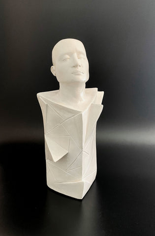 Large white ceramic sculpture entitled Tenacity, reflecting on the pieces that make an individual