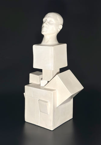 Large white ceramic sculpture representing the pieces that make a person. White. Entitled Strength