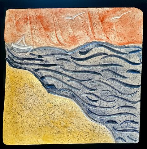 orange blue yellow ceramic tile sky beach water
