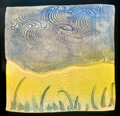 blue waves; yellow sand; grasses