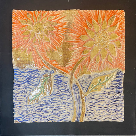 two sunflowers carved ceramic tile orange and blue water