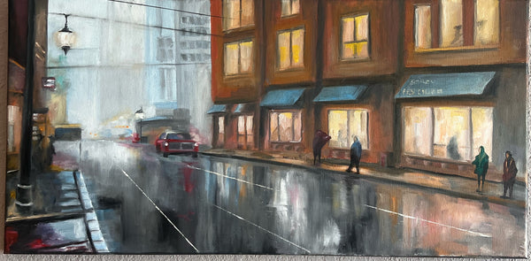 Holiday Glow on Rain Kissed Streets