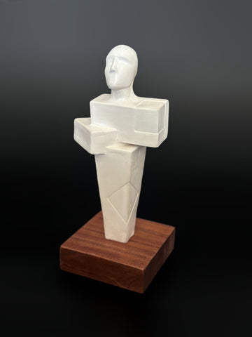 Large white ceramic sculpture representing the pieces that make a person. White. Entitled Astuteness 