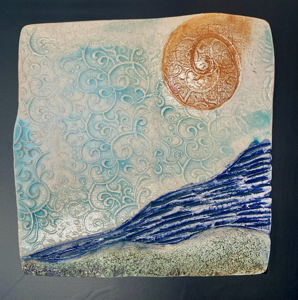 ceramic tile, orange sun, turquoise sky, deep blue water
