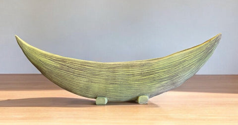 Hand built ceramic vessel. Carved. Lime boat.