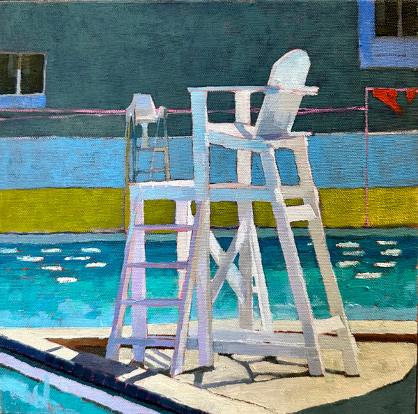 lifeguard chair along a poolside setting before a swim race
