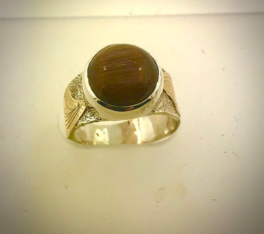 sterling silver ring with cat's eye rutilated quartz and 14k gold accents