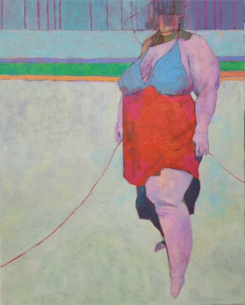 full figured woman holding a string along the shoreline in red bathing suite with pale blue top